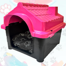 casinha para pets de plástico preto e rosa com almofada de patinhas