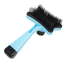 Escova azul para pets com cerdas pretas, ideal para pentear cães e gatos.